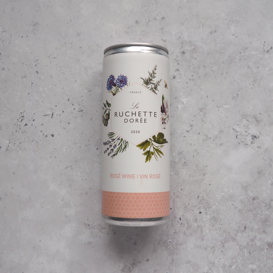 A 250ml can of French rosé wine, featuring Grenache, Cinsault, and Syrah blends in a stylish design.