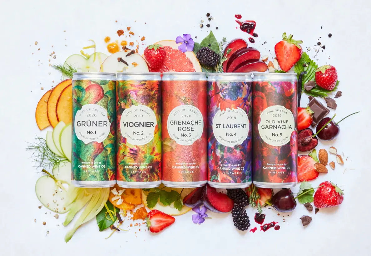 Canned Wine Co. canned wine collection – Grüner, Viognier, Grenache Rosé, St Laurent, and Old Vine Garnacha with fresh fruit and chocolate ingredients.