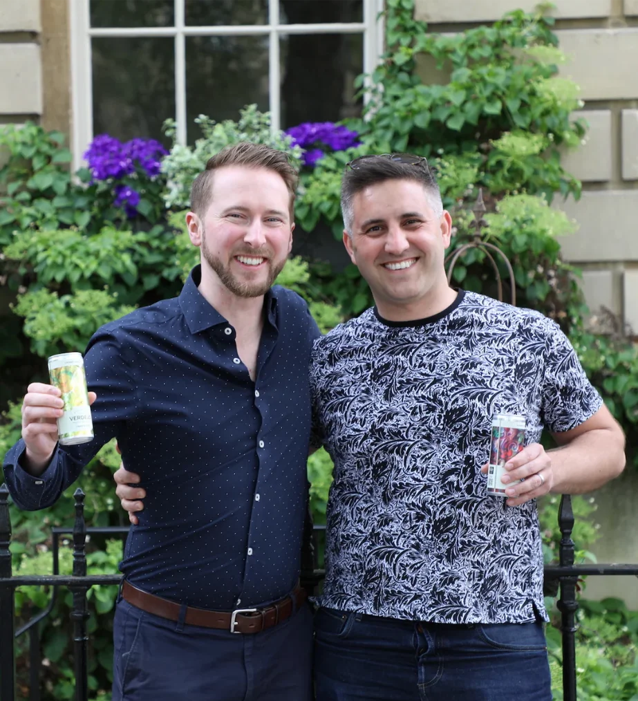 Canned Wine Co. founders Ben Franks and Simon Rollings holding premium canned wines