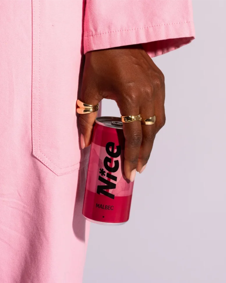 Nice Malbec canned red wine held in hand, showcasing bold full-bodied flavour with dark cherry and plum notes.