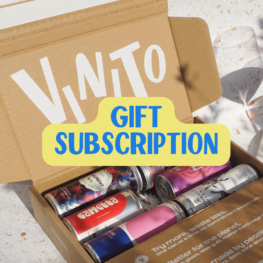 Vinito wine subscription box with assorted canned wines and text highlighting a gift subscription option.
