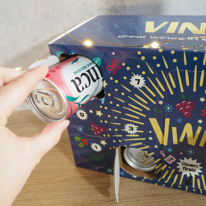 Vinito wine advent calendar with doors open, showing canned wine countdown
