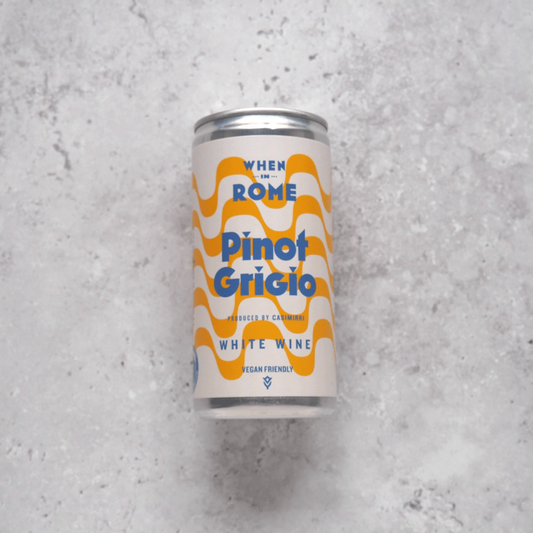 187ml can of When in Rome Pinot Grigio from Puglia, Italy - crisp Italian white wine with floral, lemon, green apple, and melon notes.